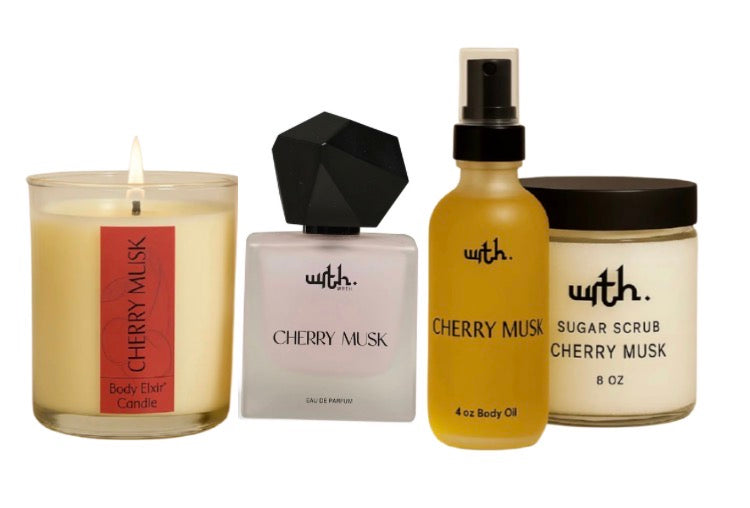 opulence bundle, body elixir candle, perfume, sugar scrub and body oil