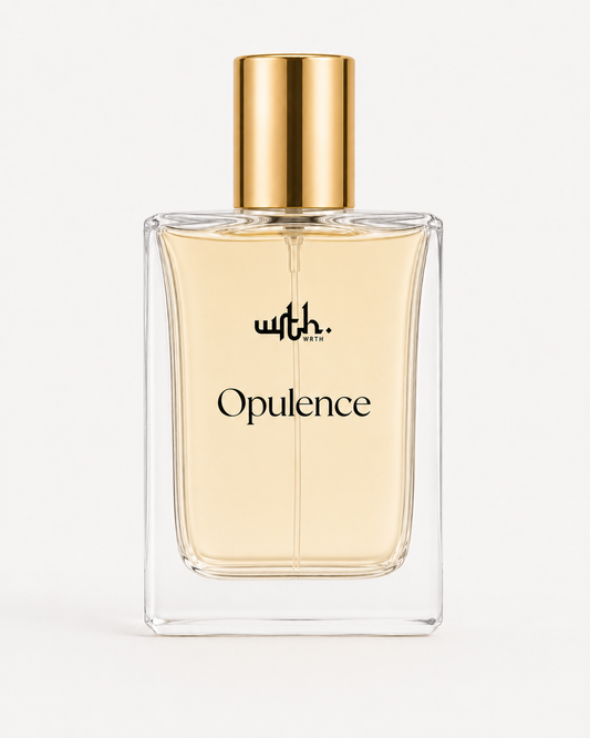 A clear rectangular glass perfume bottle filled with pale golden liquid, topped with a shiny gold cap. The bottle has black text reading 'with.