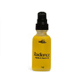Yellow bottle of Radiance Niacin & Vitamin E Oil with black cap on a white background