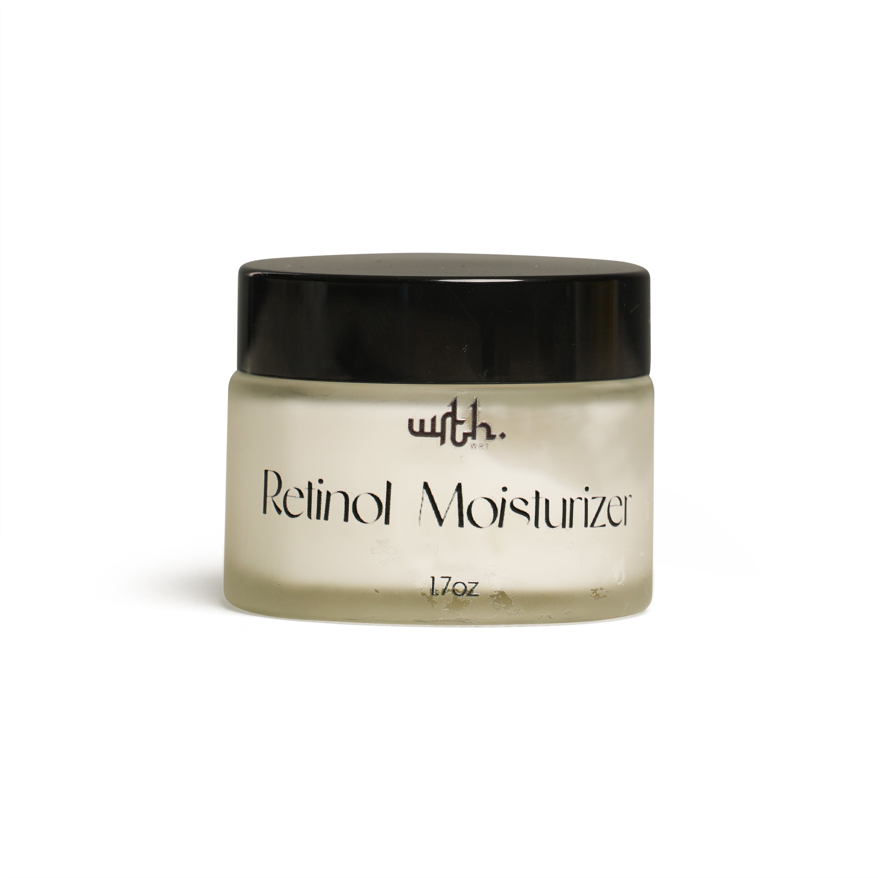 Jar of retinol moisturizer with black lid on a white background