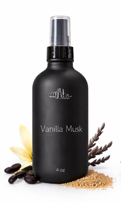Black spray bottle labeled 'Vanilla Musk' with decorative elements on a white background