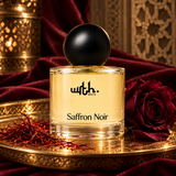 WRTH Saffron Noir Eau de Parfum on an ornate gold tray with a deep red rose and saffron threads against red velvet