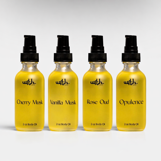 Four bottles of 'with.' brand body oils on a gray background