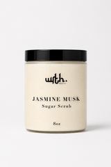 Jar of jasmine musk sugar scrub with black lid on a white background