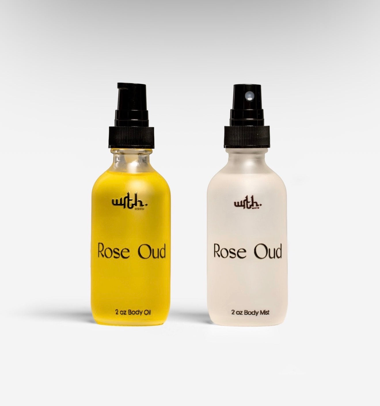 Two bottles of 'Rose Oud' body oil and mist on a white background