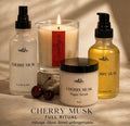 Cherry Musk skincare and candle products on a neutral background