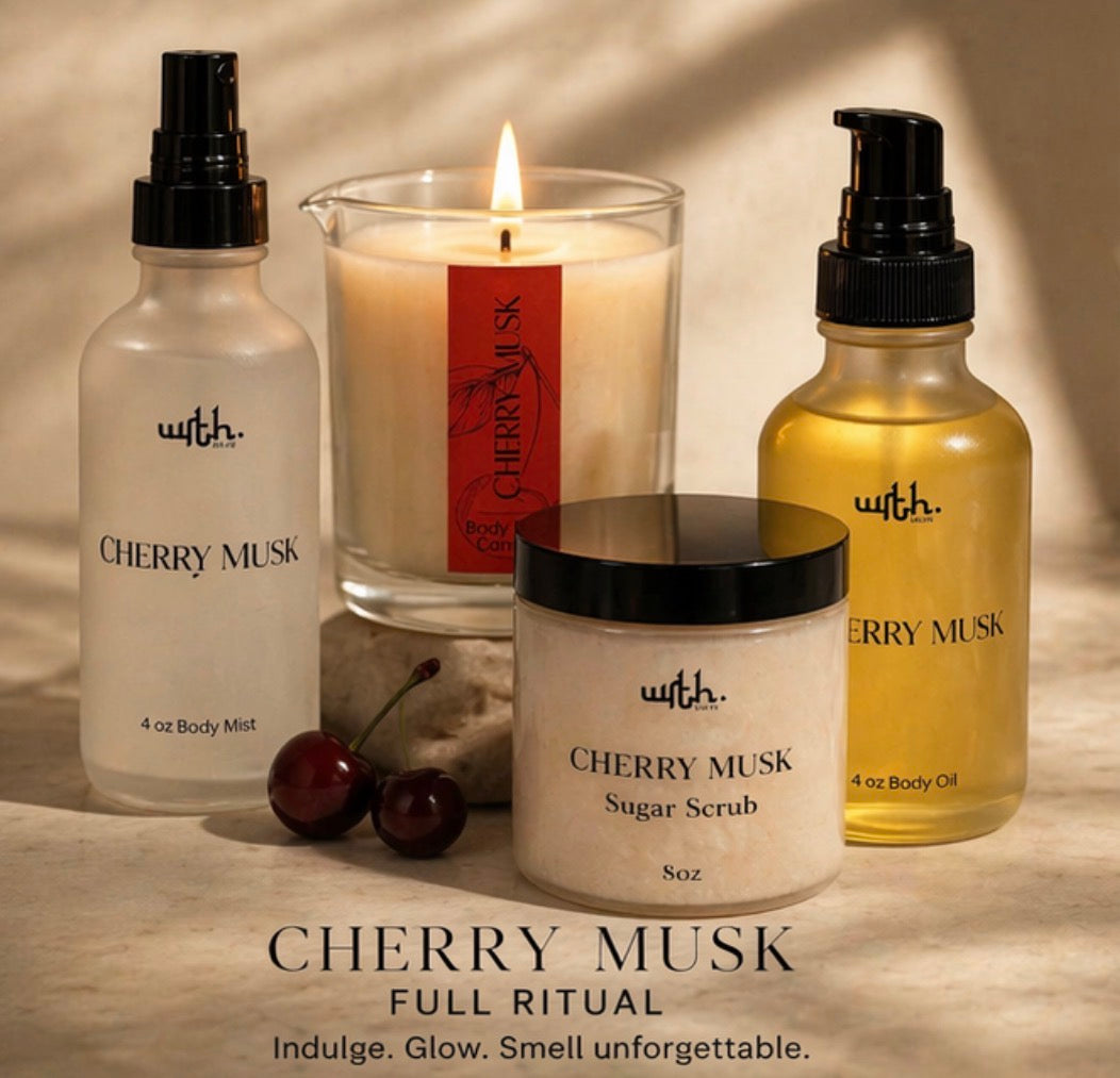 Cherry Musk skincare and candle products on a neutral background