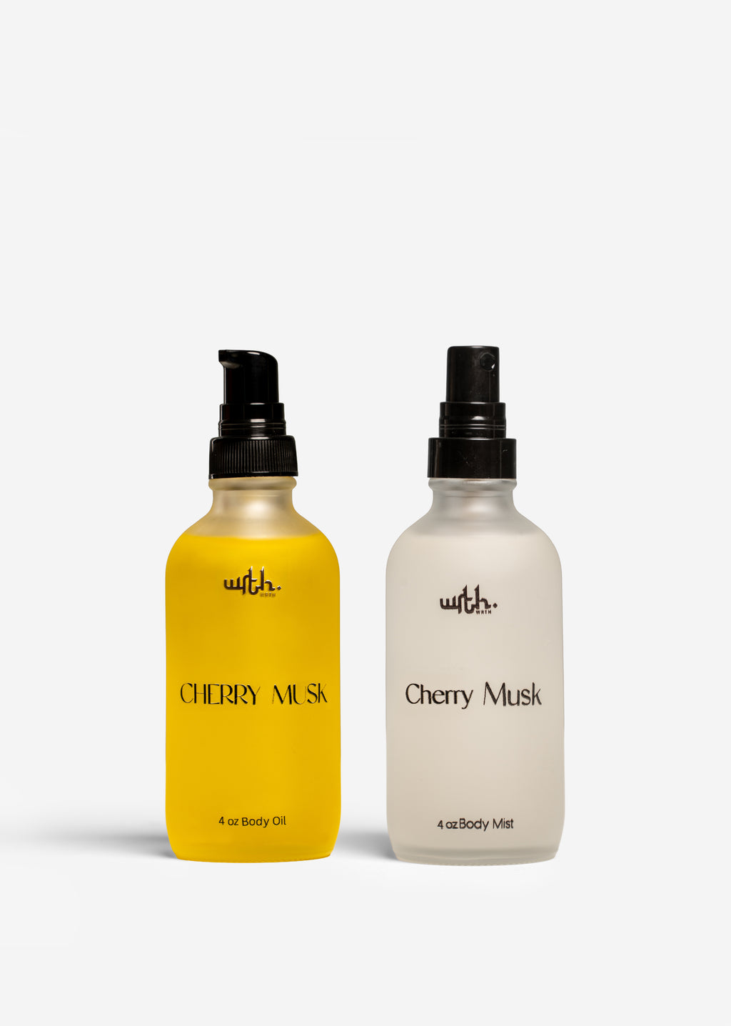 Two bottles of 'Cherry Musk' body mist, one yellow and one white, on a white background.