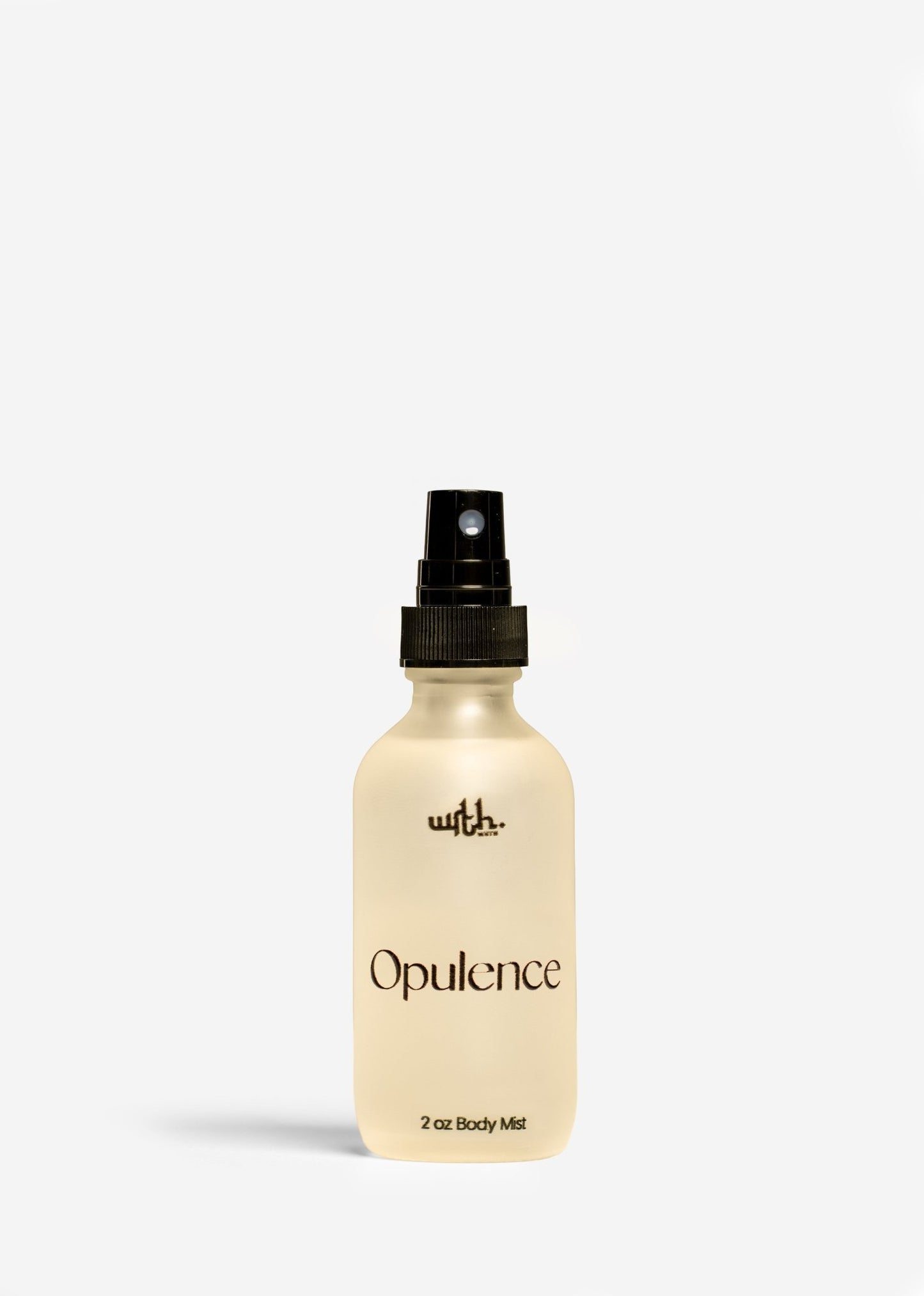2 oz spray bottle of Opulence body mist by Wrth with black spray top on white background