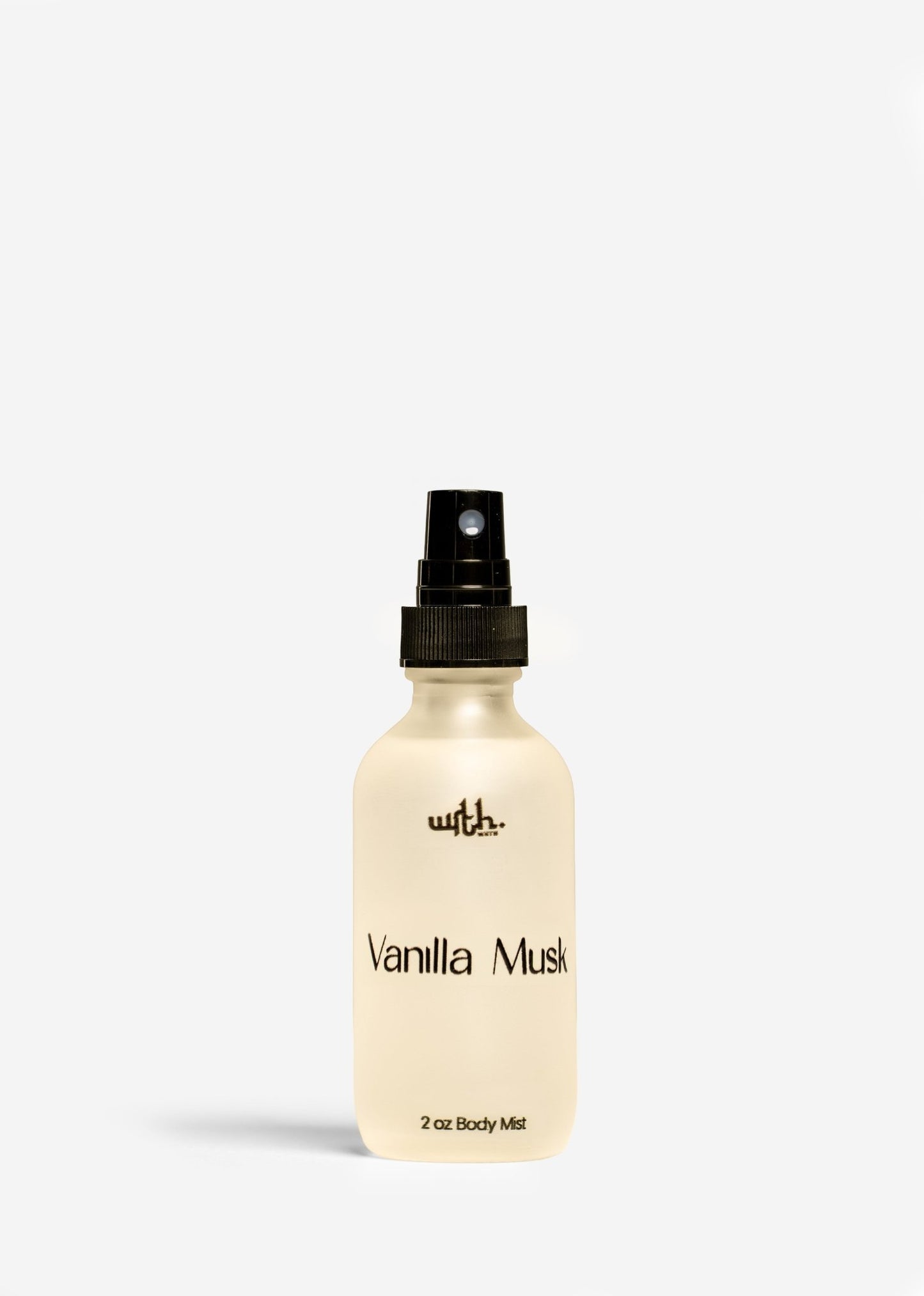 2 oz Vanilla Musk body mist spray bottle with black cap on white background by WRTH.STUDIO