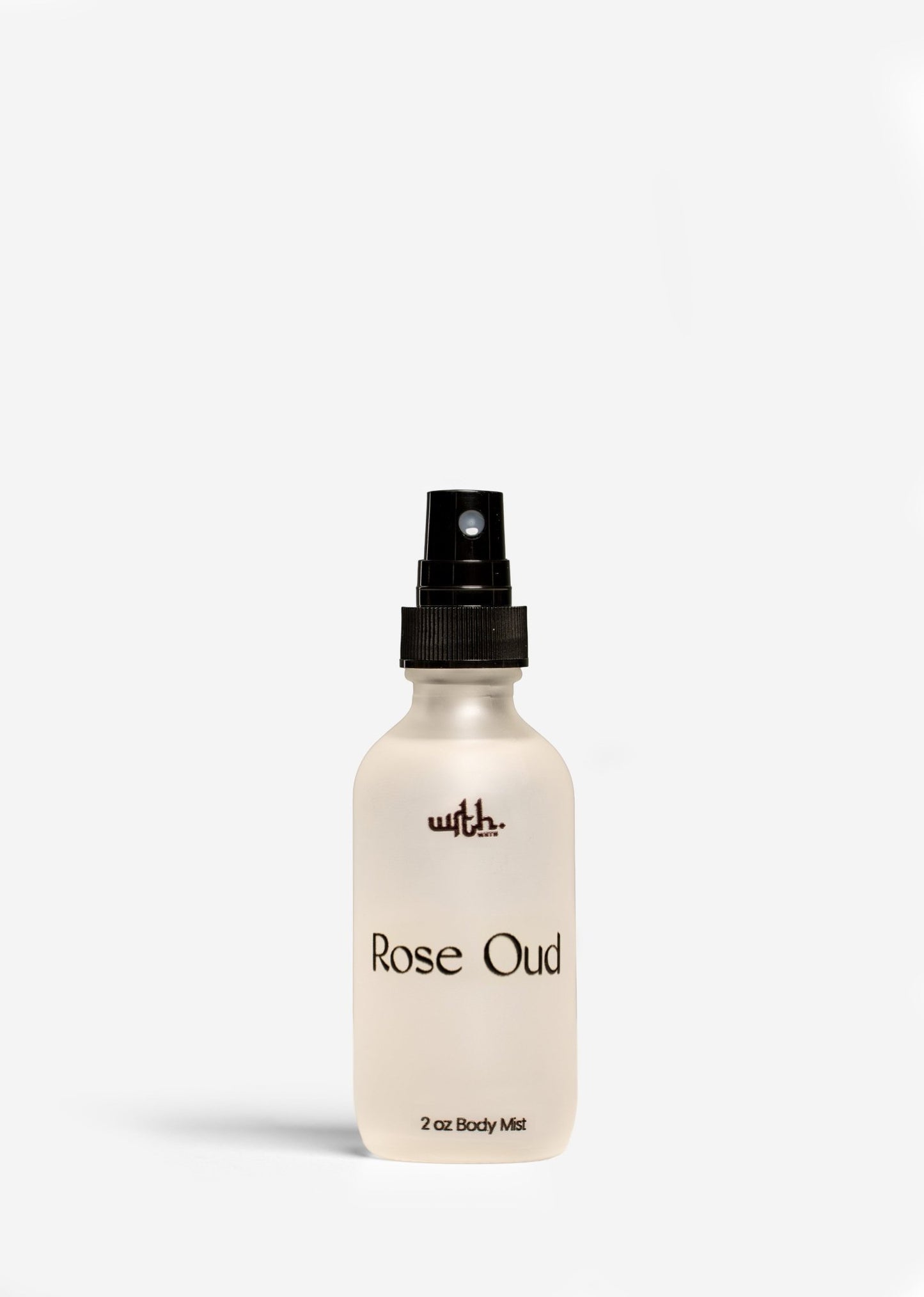 2 oz Rose Oud body mist spray bottle with black cap from WRTH.Studio on white background