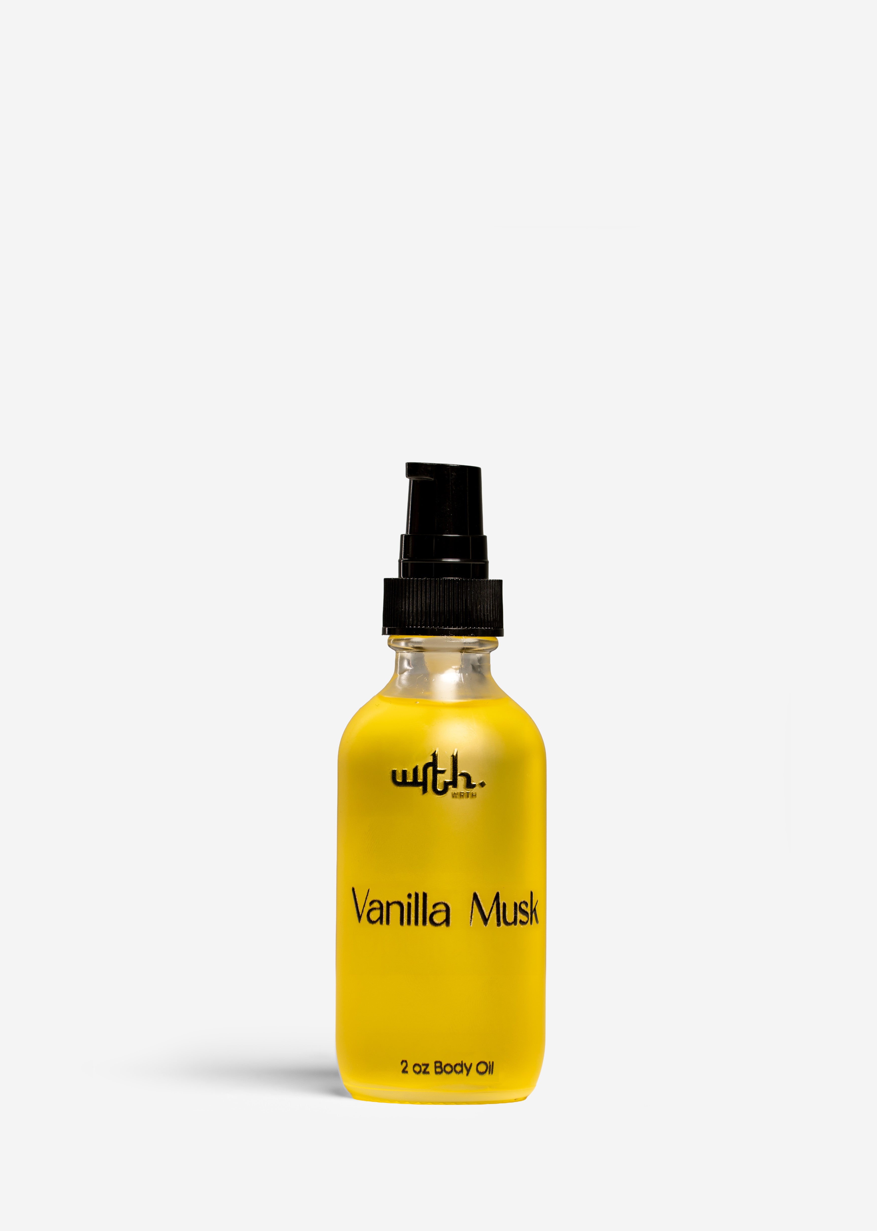Yellow bottle of 'Vanilla Musk' body oil with a black cap on a white background