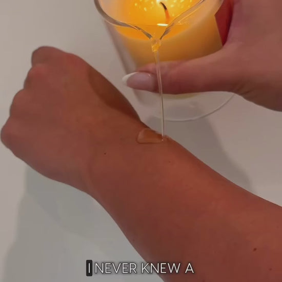 Body elixir candle being used after shower 